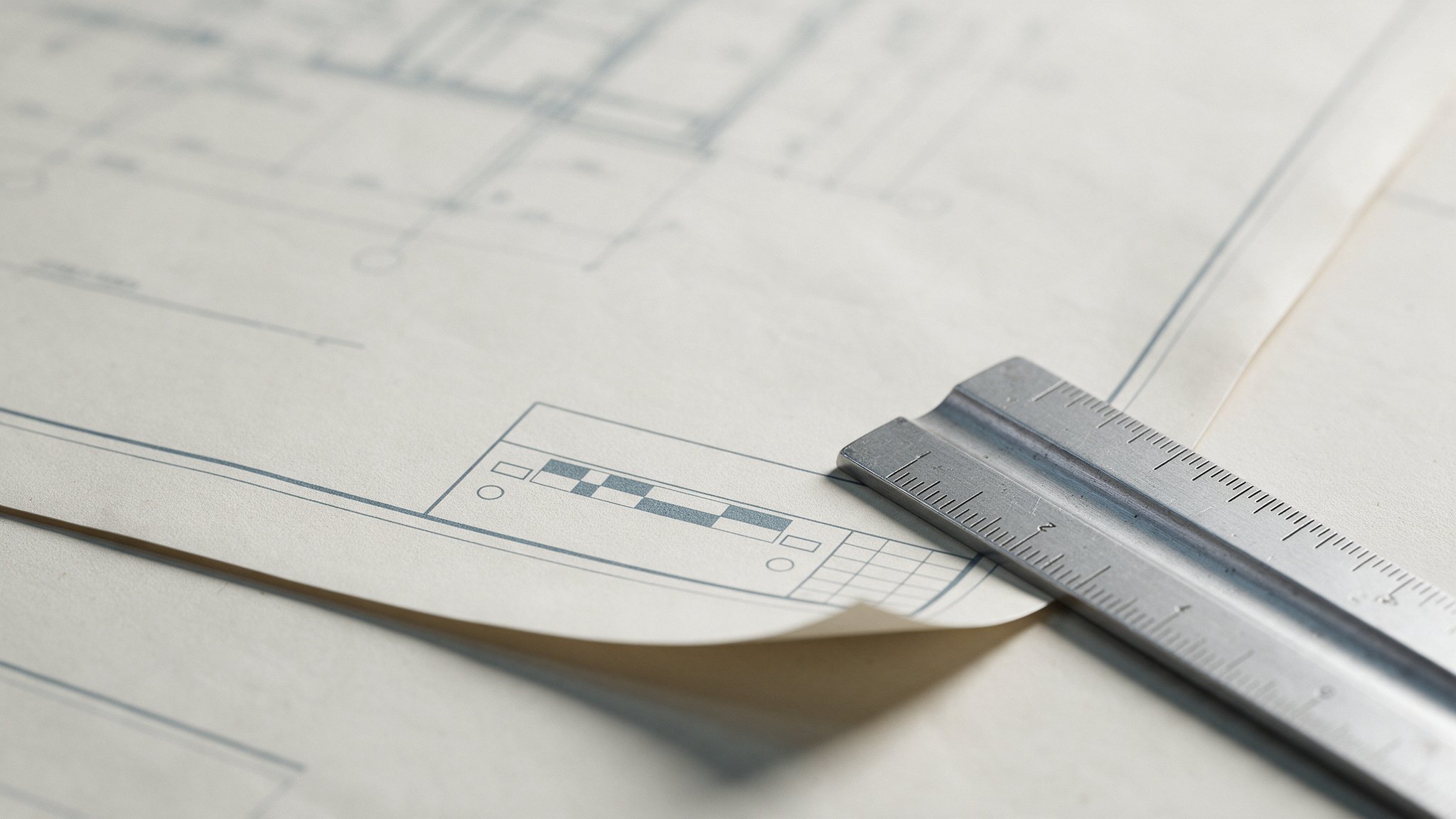 Architectural plan sheet title block with a graphic scale bar, used to check for scale drift before starting a takeoff